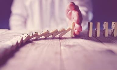 image of dominoes to represent the court bond process