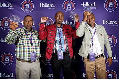 2017 Highway Heroes winner Phillip Mtembu posing at Hollard Trucking event