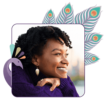 A young woman smiling as she's insured by Hollard, a South African Insurance Company