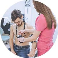 A doctor taking care of a patient with Hollard's Long-term Care benefit.