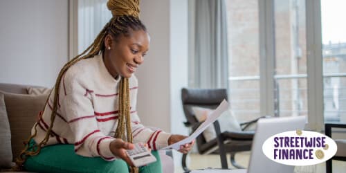 A woman using the Streetwise Finance calculators to compare and plan for smarter money choices.