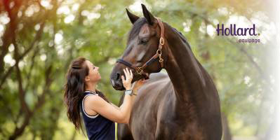 A Hollard Equipage client adjusting her horse's muzzle.