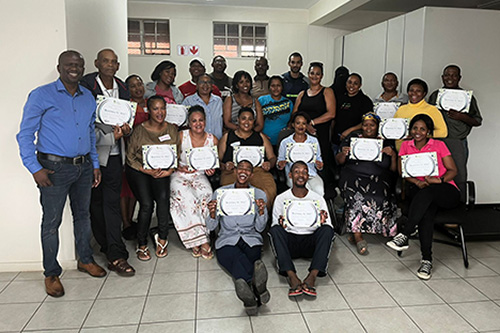 Students with certificates from the Hollard Streetwise Finance Rural SMME project