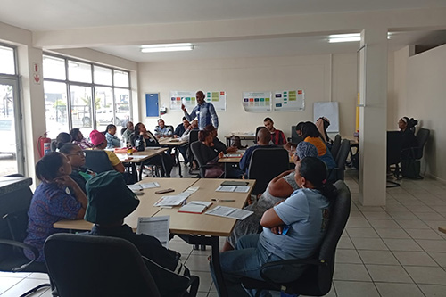 Students listening to the lecture in the classroom for the Hollard Streetwise Finance Rural SMME project